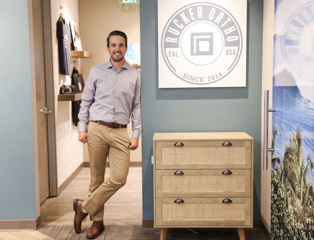 Dr. Rucker standing in his at his orthodontics practice in Murrieta, CA ready to see patients.